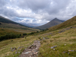 Fototapeta na wymiar hiking path going through a valley with mountains