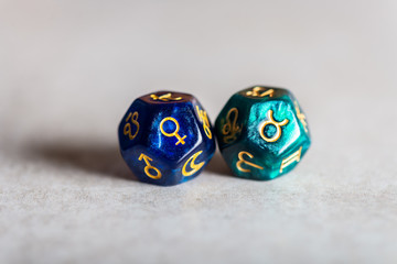 Astrology Dice with zodiac symbol of Taurus and its ruling planet Venus