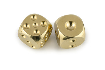 Two golden dices closeup isolated on white background. Five and one, with a shadow.