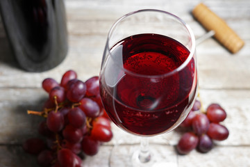 Red Wine Glass On Wooden Table