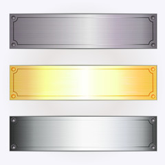 Set of three metallic plates.