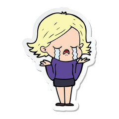 sticker of a cartoon girl crying