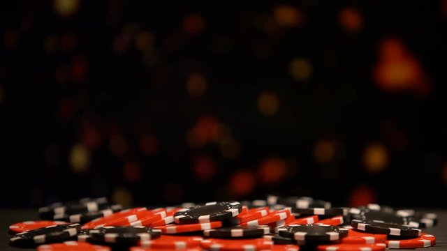 Huge pile of poker chips on sparkling background, all-in betting, fortunate game