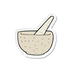 sticker of a cartoon pestle and mortar