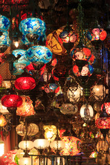 A photo of decorative Ottoman style mosaic chandeliers captured in Grand Bazaar.