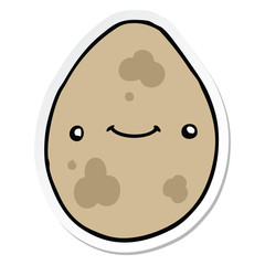 sticker of a cartoon egg