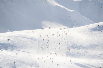 Skiing people at the slopes 