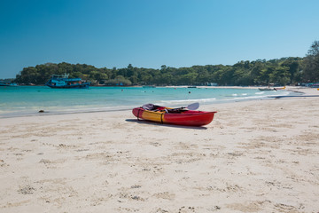 Fototapeta premium Red canoe on a beach
