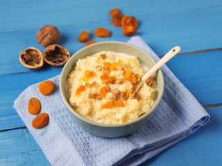 milk oatmeal with nuts and dried apricots