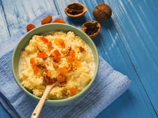 milk oatmeal with nuts and dried apricots