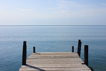 Fototapeta na wymiar pier on the sea in calm