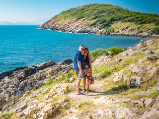 Fototapeta premium Portrait of a happy couple at the coast in Thailand