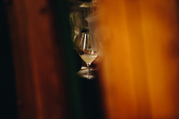 A Glass of White Wine at a Table Tasting