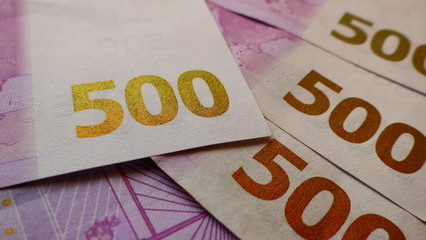Close-up view from the backside of multiple 500 Euro banknotes