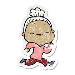 distressed sticker of a cartoon peaceful old woman