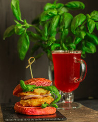 burger red, meat sandwich and basil. food background. copy space