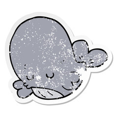 distressed sticker of a cartoon whale