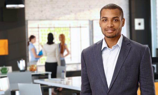 Casual black businessman at office