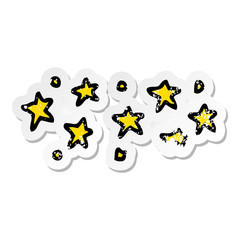 distressed sticker of a cartoon stars