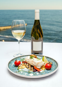 Dish With Fish And Wine