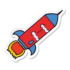 sticker of a cartoon crying rocket