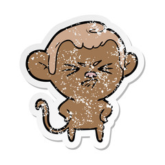 Obraz premium distressed sticker of a cartoon annoyed monkey