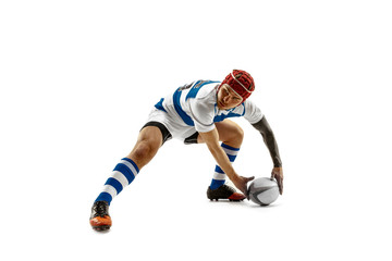 The silhouette of one caucasian rugby man player isolated on white background. Studio shot of fit man in motion or movement with ball. Jump and action concept. An incredible strain of all forces.