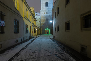 Fototapeta na wymiar Street in Warsaw old town at night