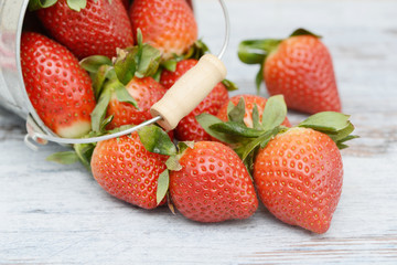 Strawberries lying on wood