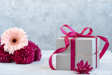 gift box with ribbon and flowers