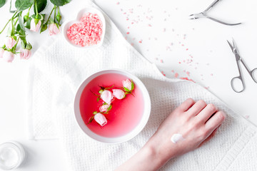 salt and cream for nail care in spa top view