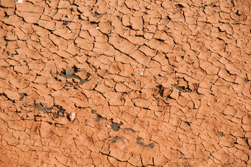 trockener rissiger roter wüstenboden, textur, hintergrund