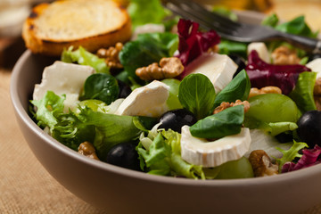 Italian spring salad with goat cheese, grapes and walnuts. Served with croutons.