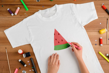 Woman drawing watermelon slice