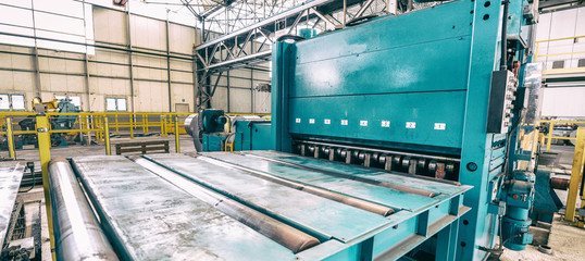 Forefront machines for coils cut, industrial warehouse and plant