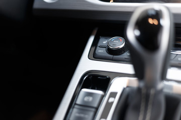 Fototapeta na wymiar Air conditioning button inside a car. Climate control unit in the new car. Modern car interior details. Car detailing. Selective focus