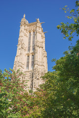 At the foot of Saint-Jacques Tower seen from the park next to it