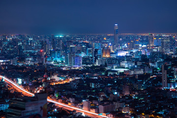 Fototapeta premium Bangkok aerial skyline at night from drone view.