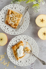 Apple pie tart, ingredients - apples and frangipane on modern background - top view