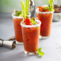 Bloody mary cocktails with garnishes for brunch