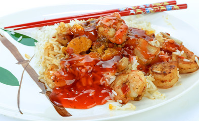 Sweet and Sour Shrimp on Bed of Steamed Rice with Chopsticks