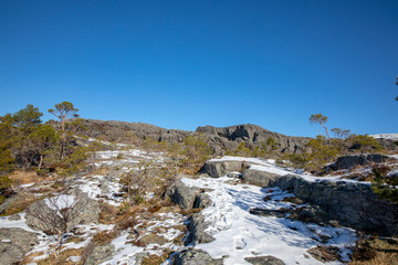 Spring and sun on mountain hiking in snow covered North Norwegian mountains