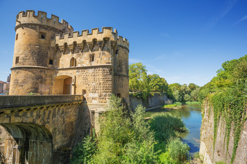 The Porte des Allemands with the Seille river. This gate is a part of the medieval fortifications...