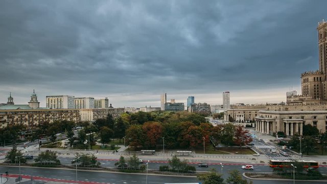 Warsaw, Poland. Time Lapse Day To Night Transition In Defilad Square In Autumn