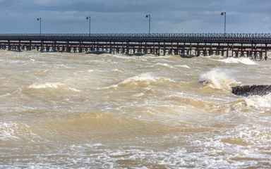 Ryde beach and pier at high tide in strong winds