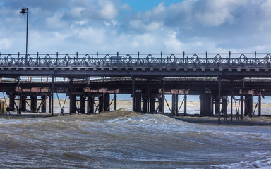 Ryde beach and pier at high tide in strong winds