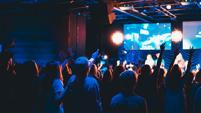 crowd of people at worship concert