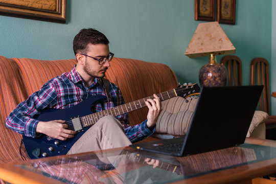 Man Learn Playing Electric Guitar At Home