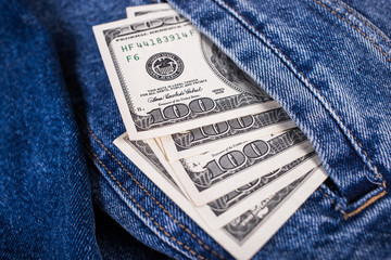 dollars in jeans pocket