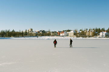 Two People on Ice in Reykjavík, Iceland